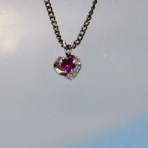 Elegant 10k Gold and pink sapphire Heart Pendant .  Beautiful for all occasions